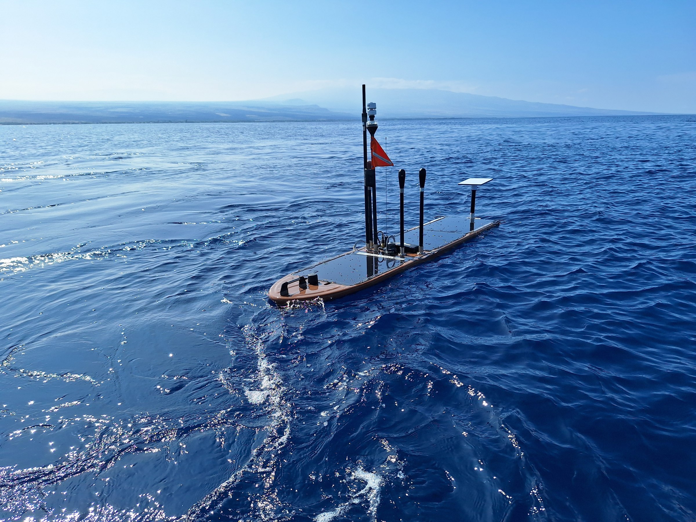 Liquid Robotics Wave Glider carrying a Hydronet payload at sea